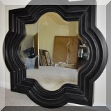 DM05. Bombay Co. large quatrefoil mirror with beveled edges and wooden frame. 42” x 42” 